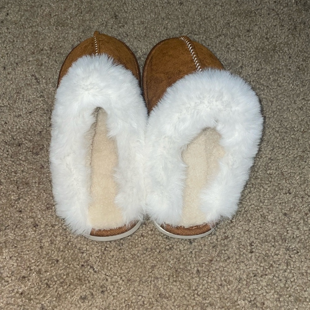 brown and white slippers